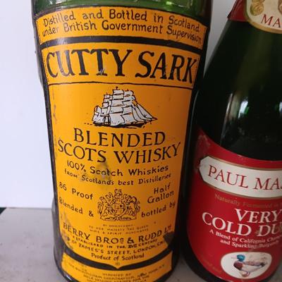 Vintage empty glass bottles with labels