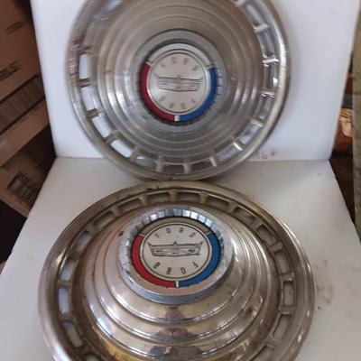 Two 1963 FordD Galaxie LTD used OEM 14" Stainless steel 18 slot hubcaps