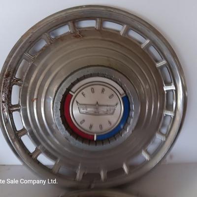 Two 1963 FordD Galaxie LTD used OEM 14" Stainless steel 18 slot hubcaps