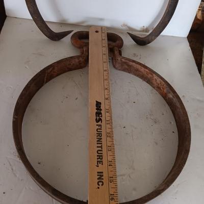 old antique iron tongs, primitive vintage farm icehouse block and steel ring with a handle