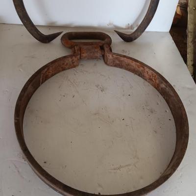 old antique iron tongs, primitive vintage farm icehouse block and steel ring with a handle