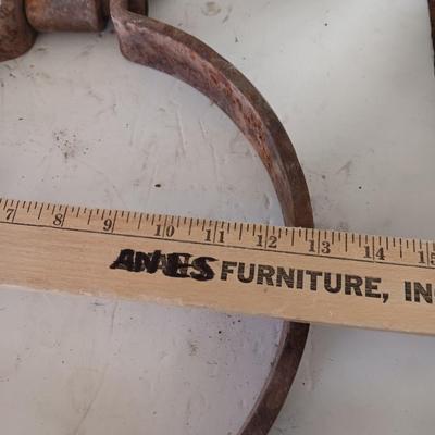 old antique iron tongs, primitive vintage farm icehouse block and steel ring with a handle