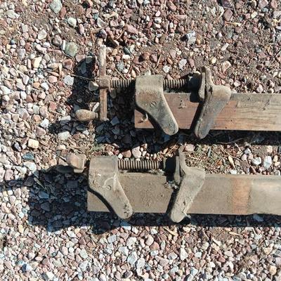 Two old T Handled clamps.