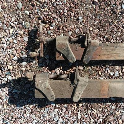 Two old T Handled clamps.