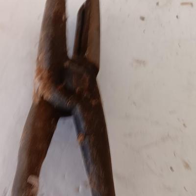 Blacksmith Blacksmithing tools Pliers, nips and hammer.