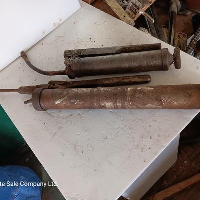 Two grease guns - Lincoln - Comet Equipment Company Nebraska