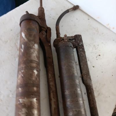 Two grease guns - Lincoln - Comet Equipment Company Nebraska