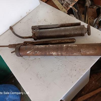 Two grease guns - Lincoln - Comet Equipment Company Nebraska