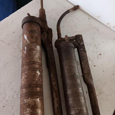 Two grease guns - Lincoln - Comet Equipment Company Nebraska