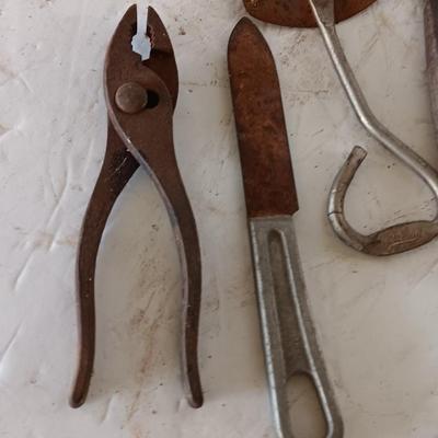 Several vintage hand tools - pilers - snips- and more