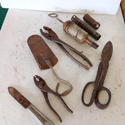 Several vintage hand tools - pilers - snips- and more