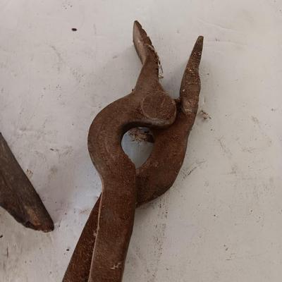 Blacksmith tools Blacksmithing pliers bars and hammer