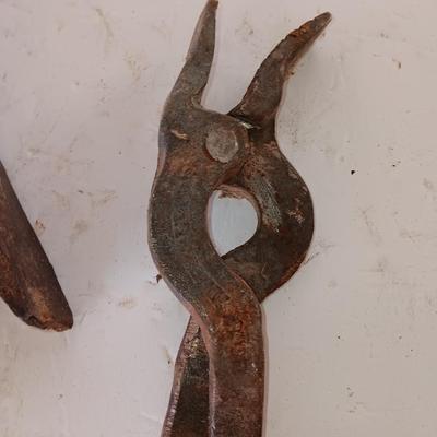 Blacksmith tools Blacksmithing pliers bars and hammer