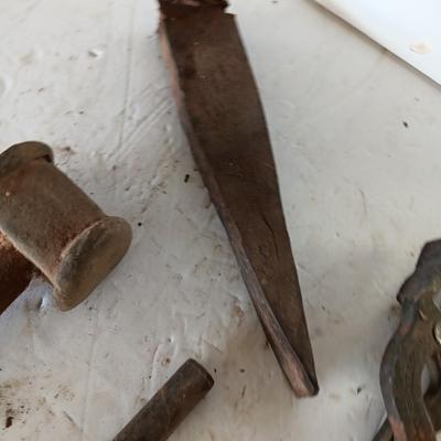 Blacksmith tools Blacksmithing pliers bars and hammer