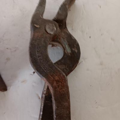 Blacksmith tools Blacksmithing pliers bars and hammer