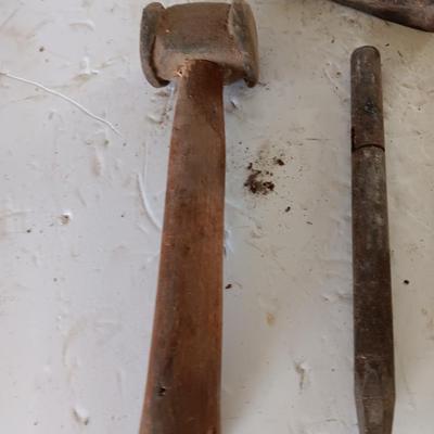 Blacksmith tools Blacksmithing pliers bars and hammer