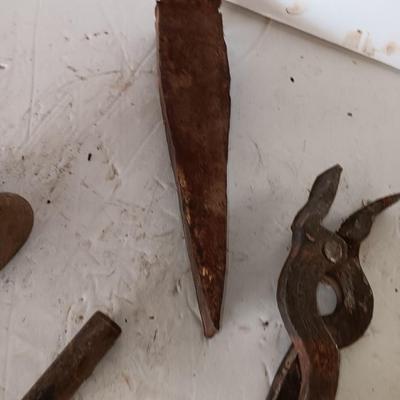 Blacksmith tools Blacksmithing pliers bars and hammer