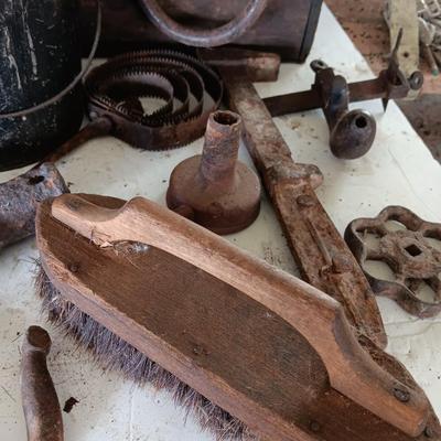 Antique wooden box with Antique farm items and tools
