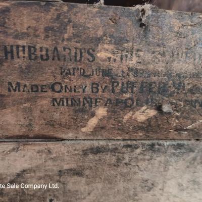 Antique wooden box with Antique farm items and tools