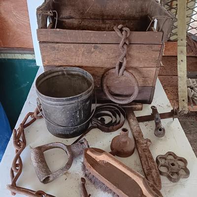 Antique wooden box with Antique farm items and tools