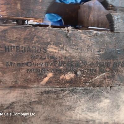 Antique wooden box with Antique farm items and tools
