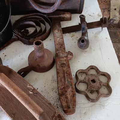 Antique wooden box with Antique farm items and tools