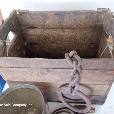 Antique wooden box with Antique farm items and tools