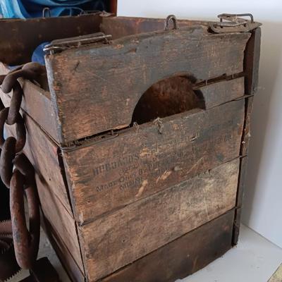 Antique wooden box with Antique farm items and tools