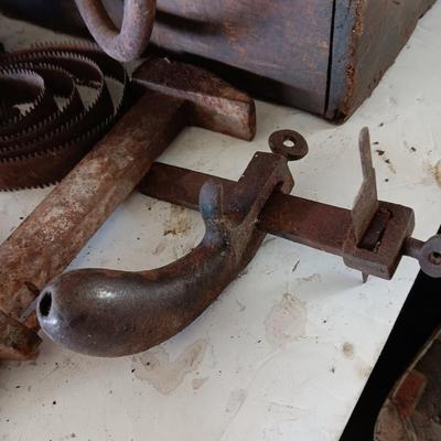 Antique wooden box with Antique farm items and tools