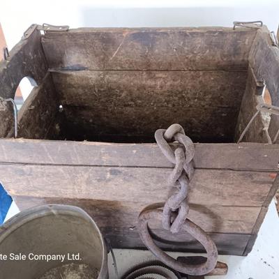 Antique wooden box with Antique farm items and tools