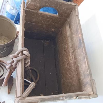 Antique wooden box with Antique farm items and tools