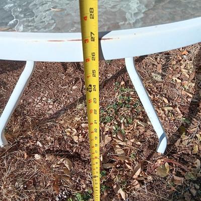 39" Round glass topped patio table with Plantation Pattern Umbrella.
