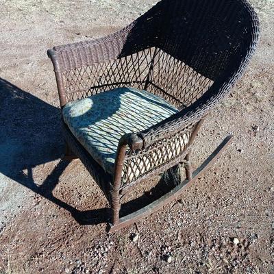 Wicker patio rocker with padded seat