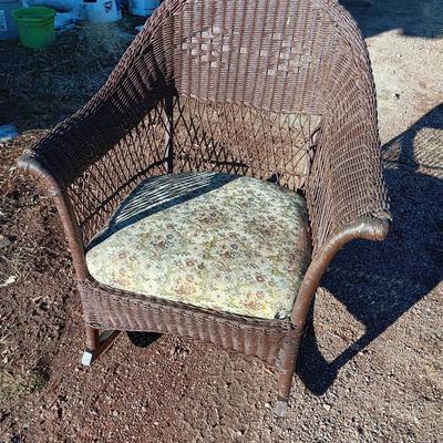 Wicker patio rocker with padded seat