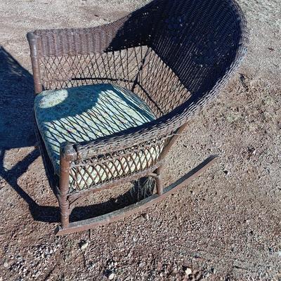 Wicker patio rocker with padded seat