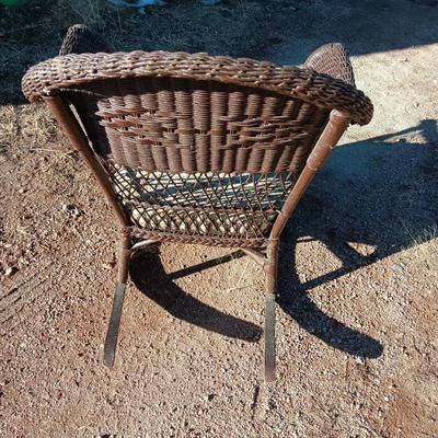 Wicker patio rocker with padded seat