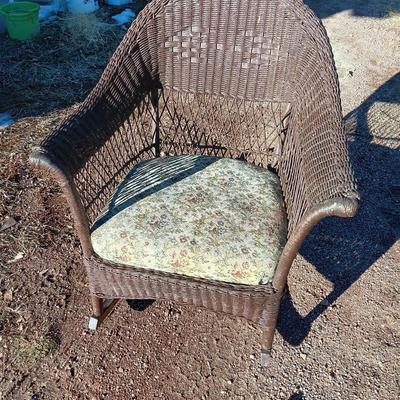 Wicker patio rocker with padded seat
