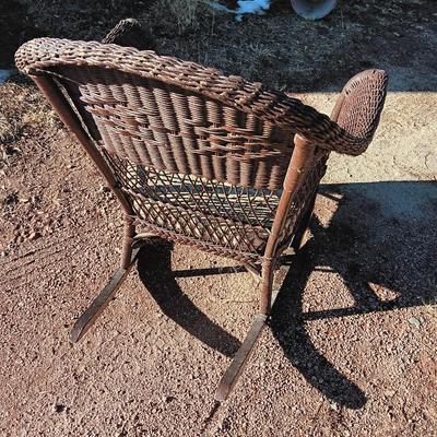 Wicker patio rocker with padded seat