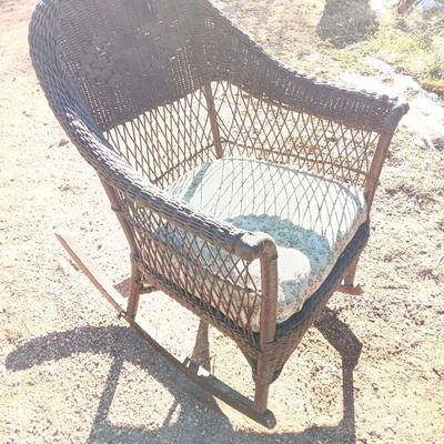 Wicker patio rocker with padded seat