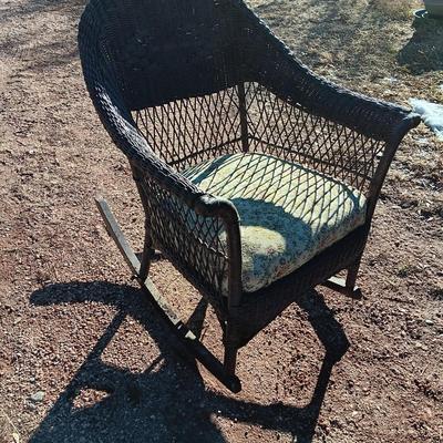 Wicker patio rocker with padded seat