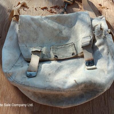 Vintage canvas fish bag with Vintage Fishing pole in canvas bag