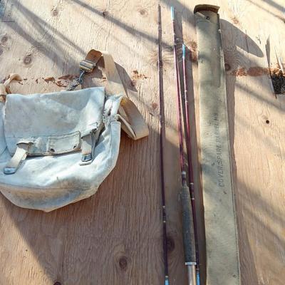 Vintage canvas fish bag with Vintage Fishing pole in canvas bag
