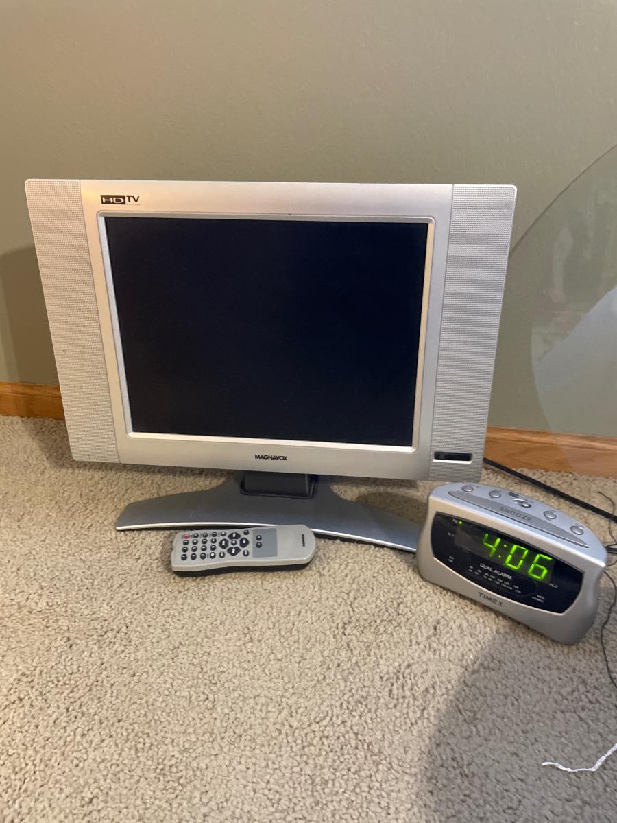 Timex alarm clock and Magnovox 14” tv