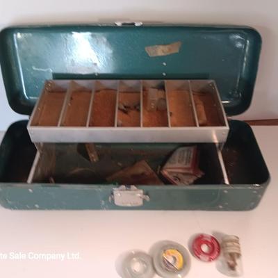Vintage metal tacklebox with cork lined storage and some tackle.