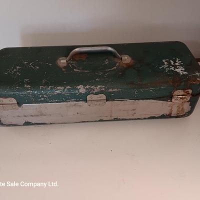 Vintage metal tacklebox with cork lined storage and some tackle.