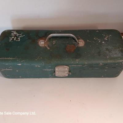 Vintage metal tacklebox with cork lined storage and some tackle.
