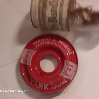 Vintage metal tacklebox with cork lined storage and some tackle.
