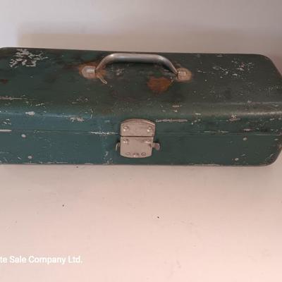 Vintage metal tacklebox with cork lined storage and some tackle.
