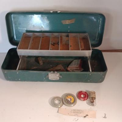 Vintage metal tacklebox with cork lined storage and some tackle.