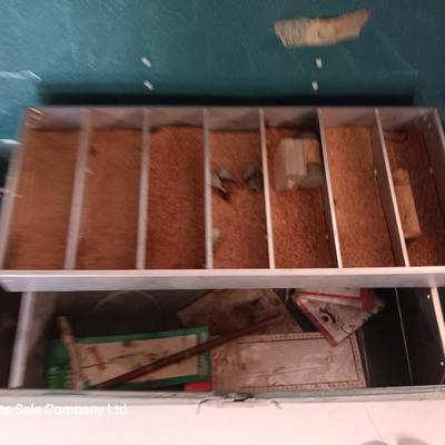 Vintage metal tacklebox with cork lined storage and some tackle.